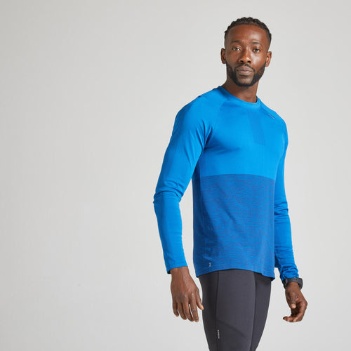 A photo of the Kiprun Care Breathable Long Sleeve Running T-Shirt Men's in use