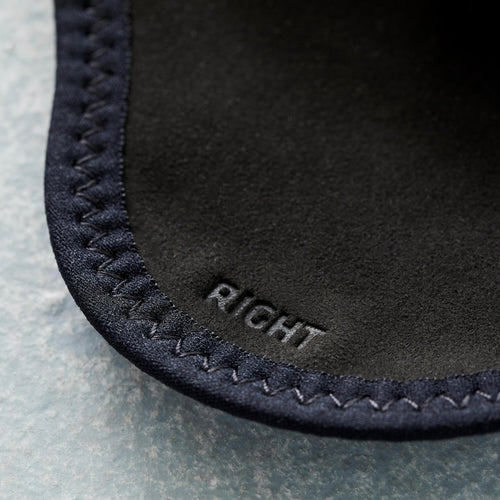 A photo of the Domyos Weight Training Grip Pad Glove in use