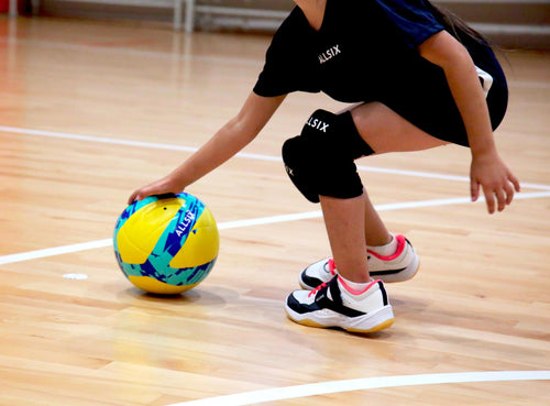 A photo of the Allsix V100 Indoor Volleyball Official Size in use