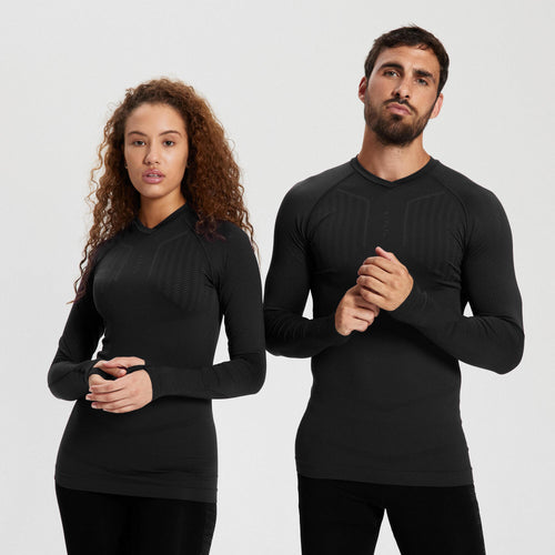A photo of the Adult Long-Sleeved Thermal Base Layer Top Keepdry 500 - White in use