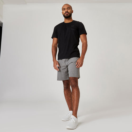 A photo of the Men's Fitness Shorts 500 Essentials - Grey in use