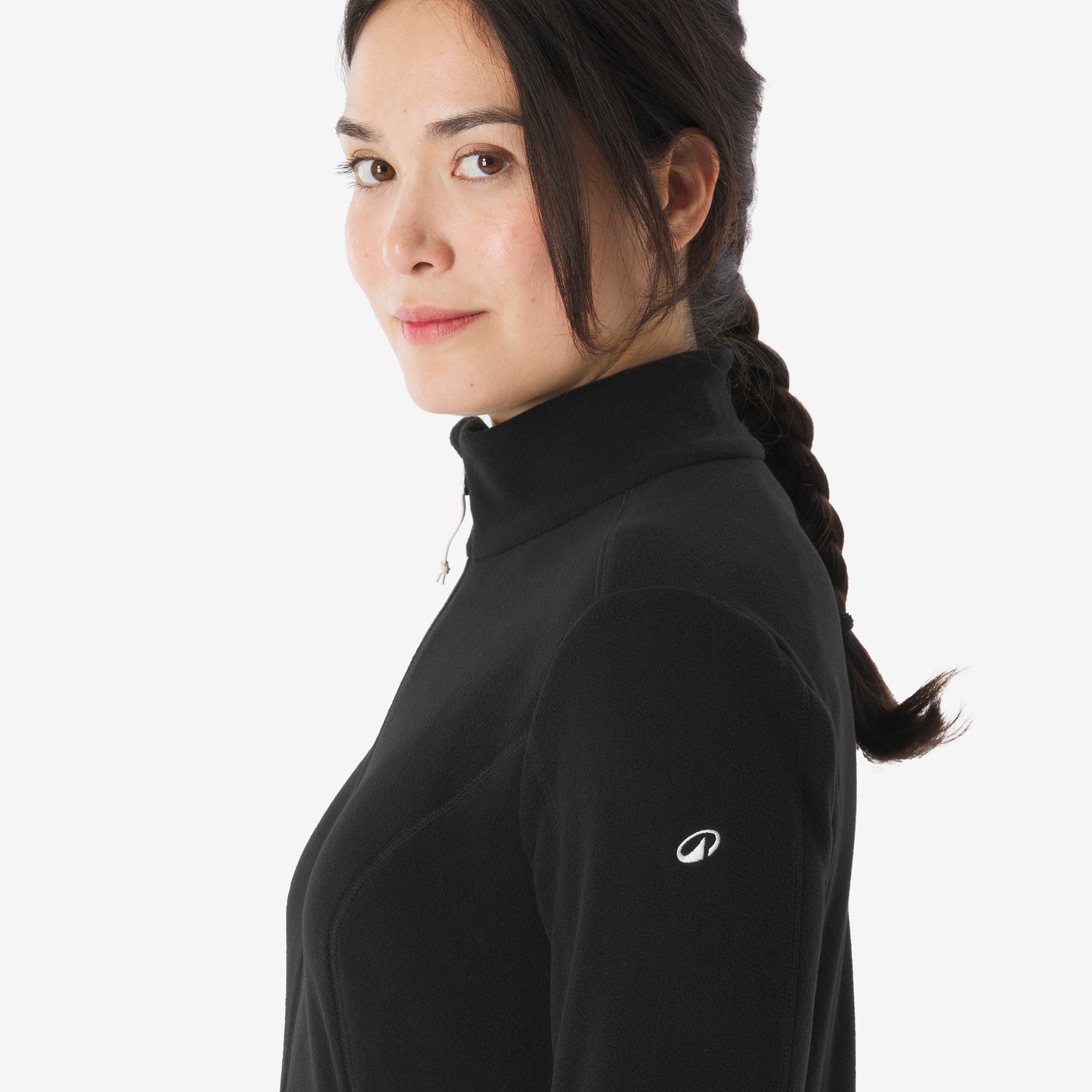 Woman wearing a black turtleneck with a logo on a white background