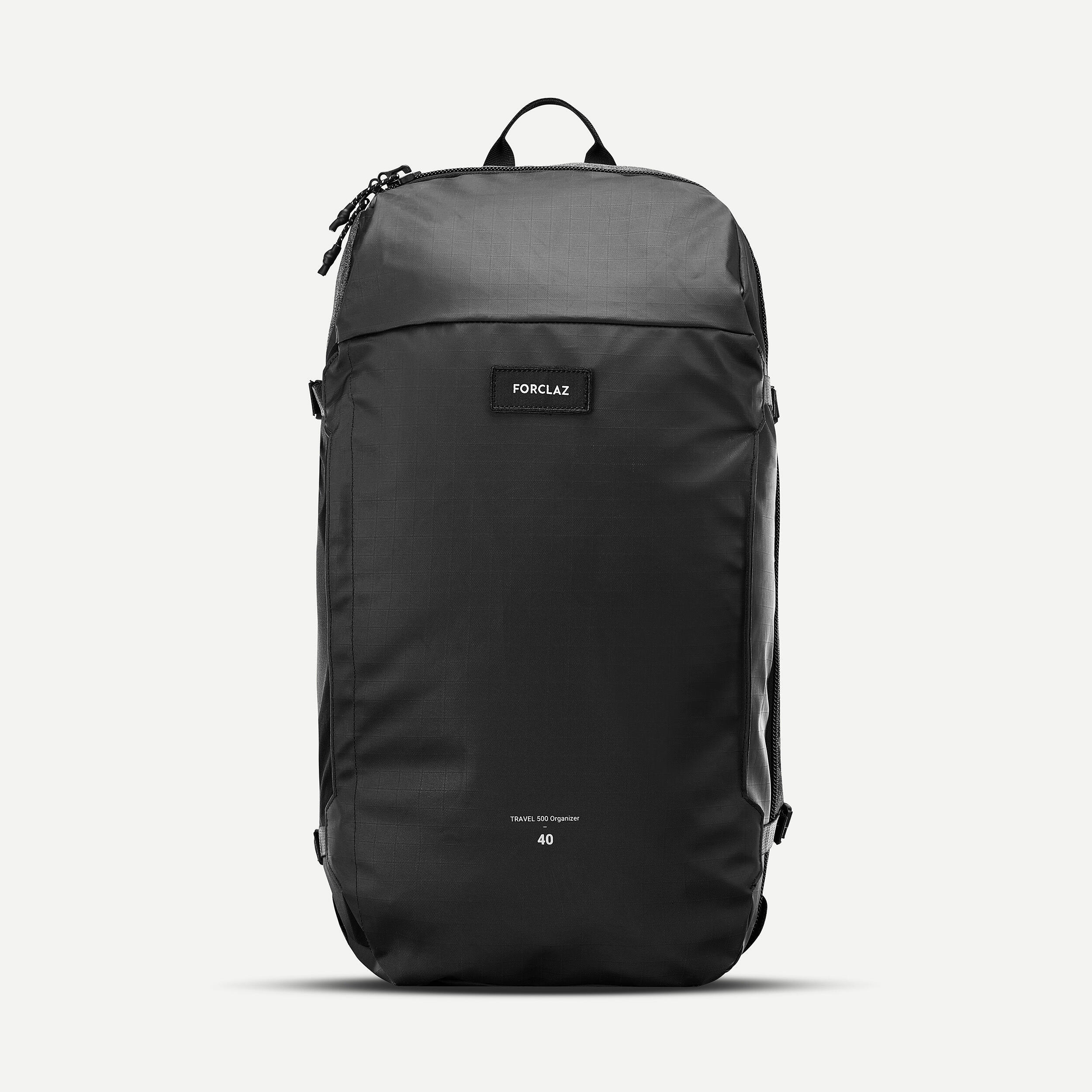 {*unspecified-8735937*} Black backpack with 'FORCLAZ' brand logo on a white background