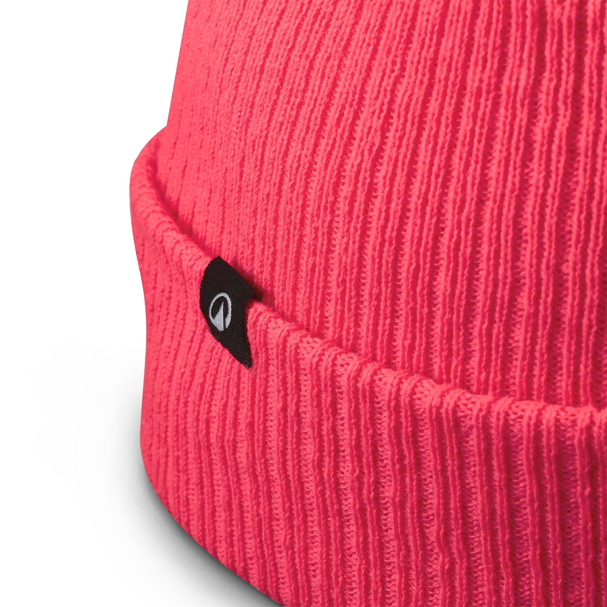 Close-up of a red knit beanie with a brand logo on a white background