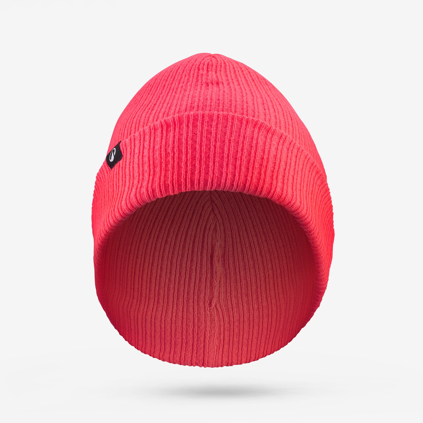 Red beanie hat with a small logo on a light gray background