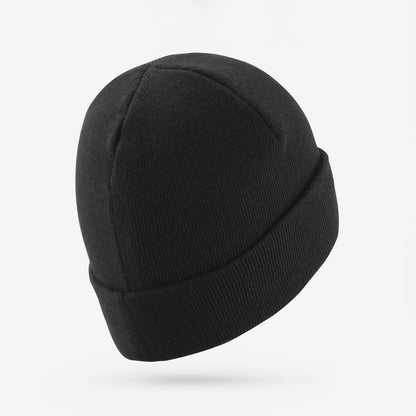 Black beanie hat on a light gray background