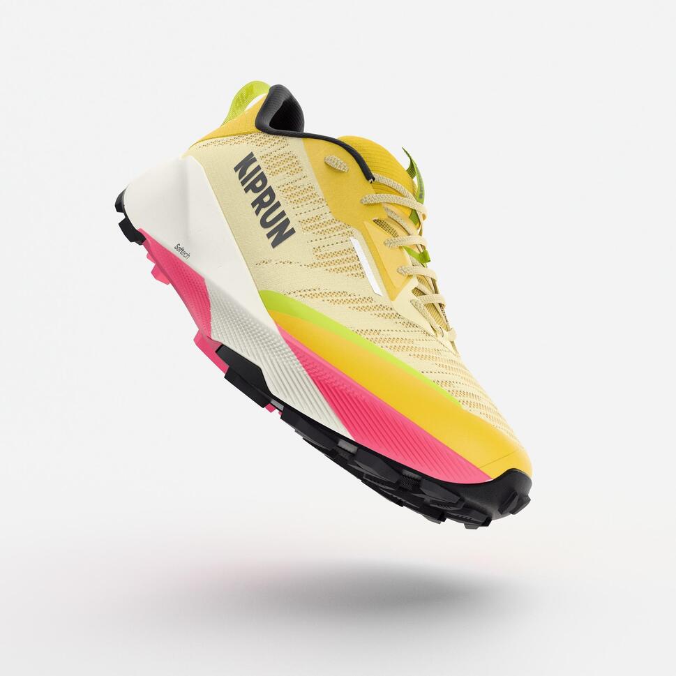 Yellow and pink running shoe with 'Kiprun' branding on a white background