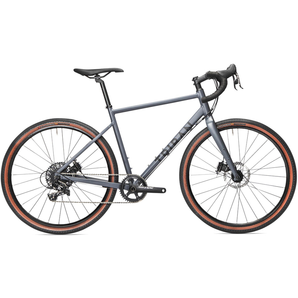 Green Triban GRVL520 gravel bike with disc brakes.